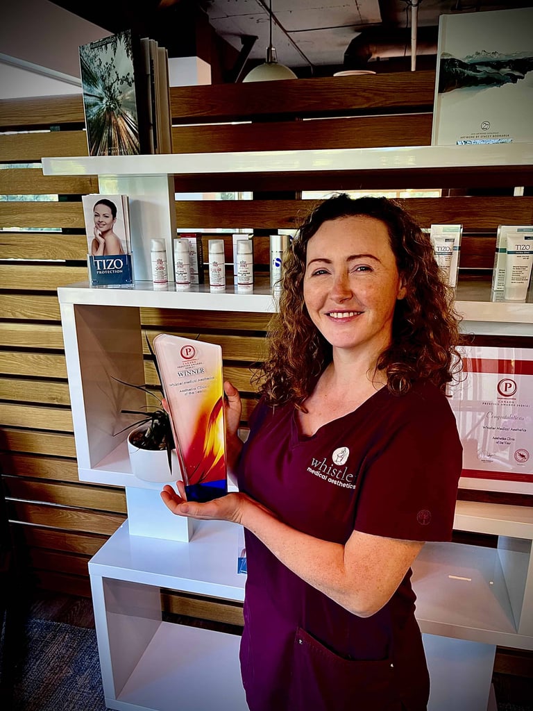 Dr Sarah Kennea in our award winning whistler clinic holding