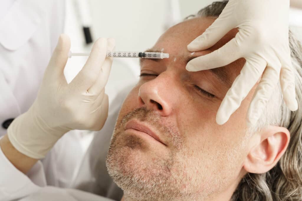 Brotox male being treated with botox